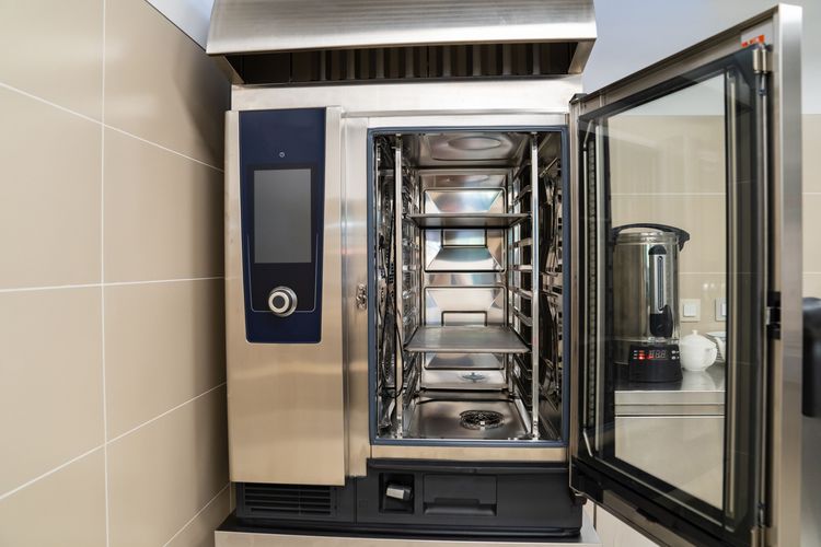 Large Combi Oven with the door ajar displaying the interior cooking chamber